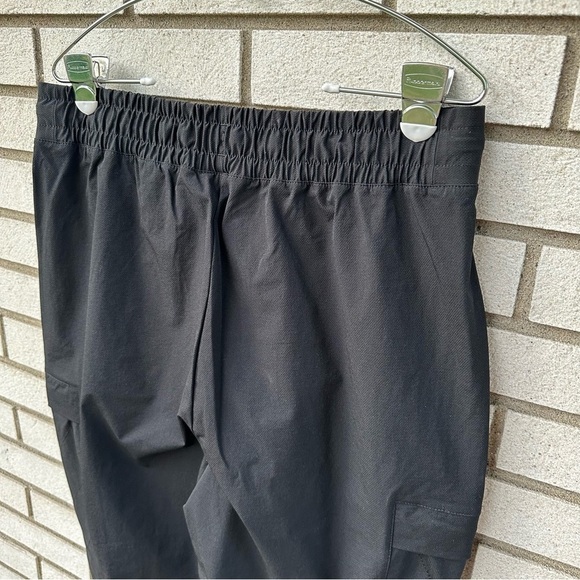 Sweaty Betty Black Trekker Hiking Pants L Utility Pockets Zipper Hem Athleisure - Picture 8 of 10
